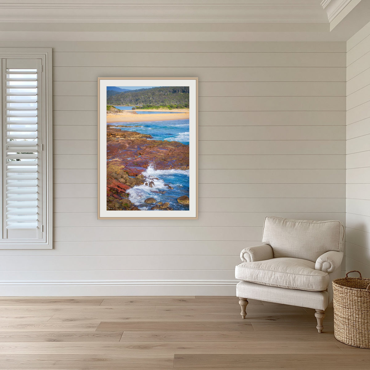 Short Point framed print in oak with a white mat, in a coastal lounge room