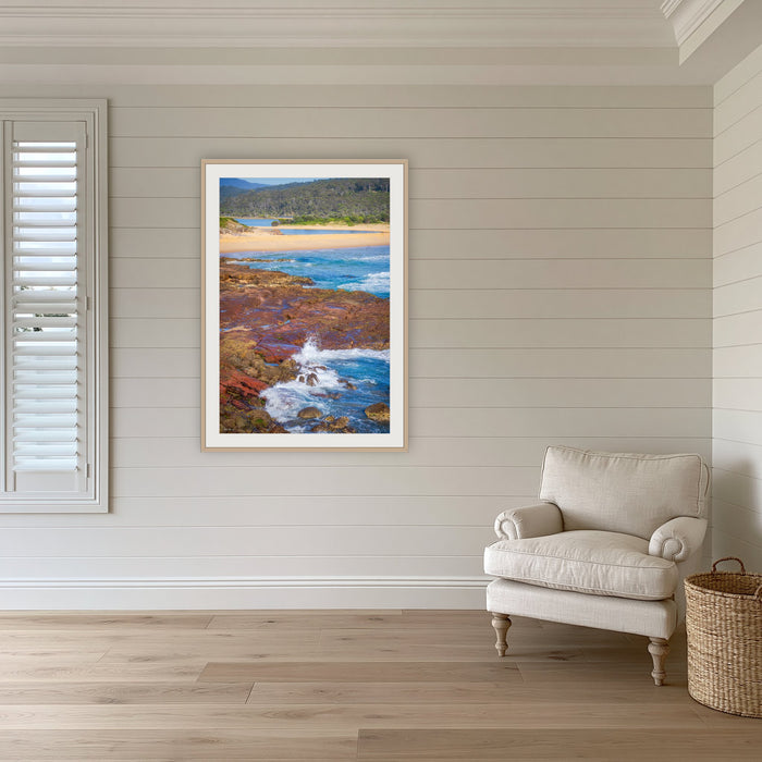 Short Point framed print in oak with a white mat, in a coastal lounge room