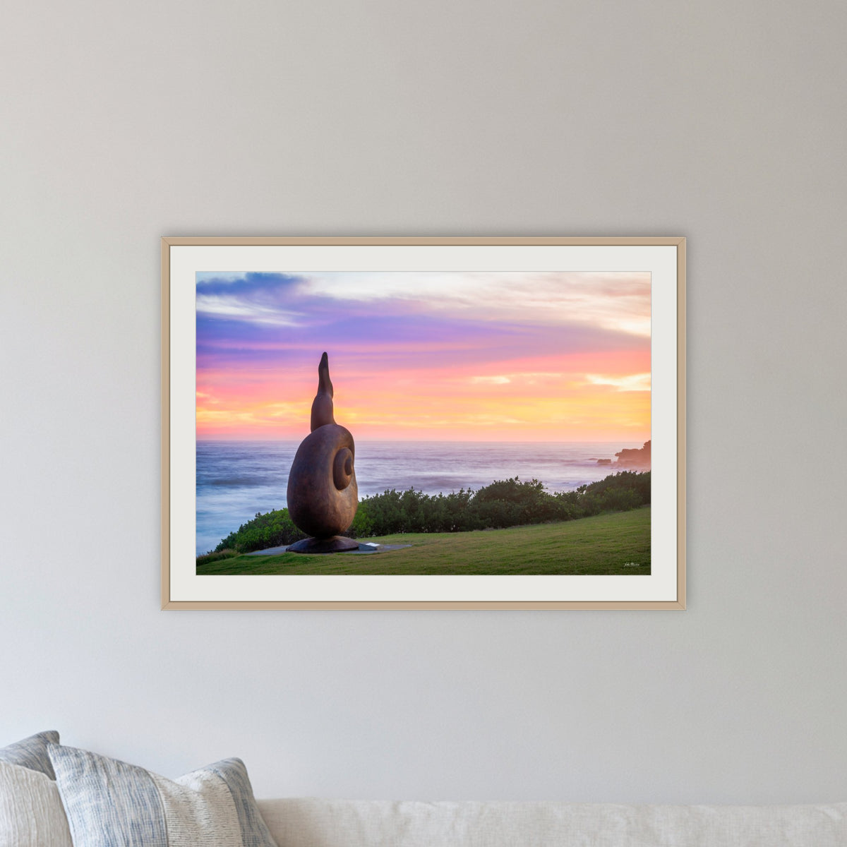 Short Point Sculpture framed print in oak with a white mat, in a lounge room
