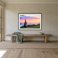 Short Point Sculpture framed print in black with a white mat, above an oak bench in a hallway