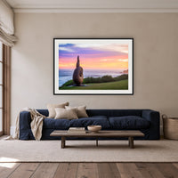 Short Point Sculpture framed print in black with a white mat, above a navy linen sofa in a lounge room
