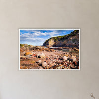 Lennards Island in a white frame without a mat, on a hallway wall