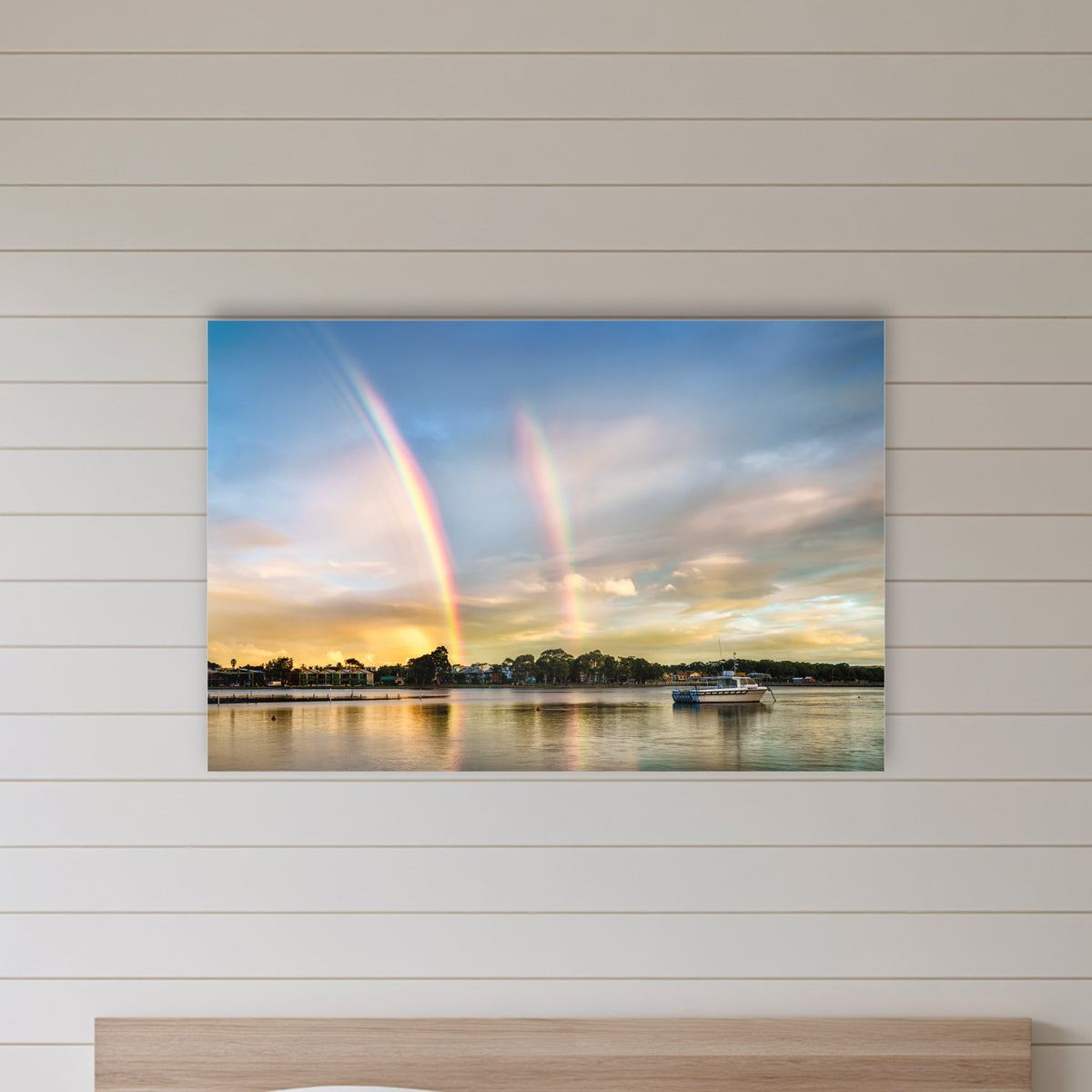 Rainbow over Merimbula Lake acrylic panel wall art in a shiplap-panelled bedroom