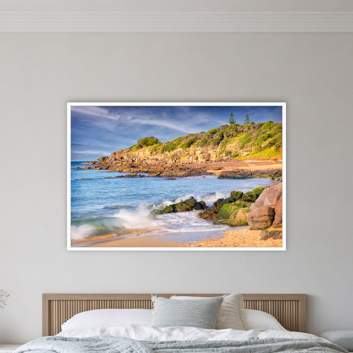 Short Point Cliffs in a white frame without a mat, on a coastal bedroom wall
