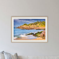 Short Point Cliffs framed print in oak with a white mat, in a lounge room