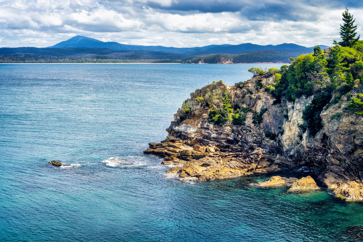 Mount Imlay rising beyond the forested coastline and clear water near Eden — fine art print