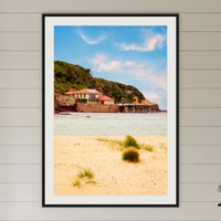 Merimbula Wharf from Main Beach framed print in black with a white mat, in a coastal bedroom