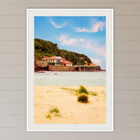Merimbula Wharf from Main Beach framed print in white with a mat, in a coastal lounge room