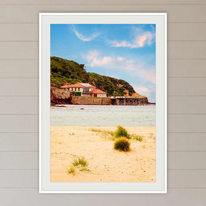 Merimbula Wharf from Main Beach framed print in white with a mat, in a coastal lounge room