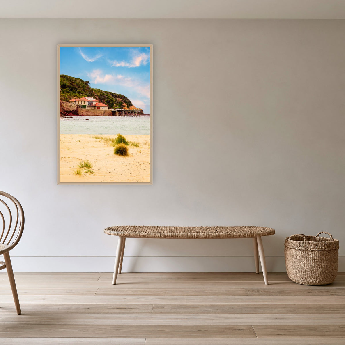Merimbula Wharf from Main Beach in an oak frame without a mat, in a cane-panelled hallway