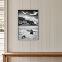 Merimbula Wharf from Main Beach in black and white, in a black frame without a mat, on a panelled hallway wall