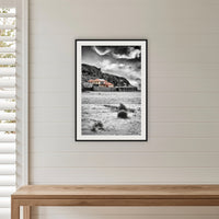 Merimbula Wharf from Main Beach framed print in black with a white mat, in a shiplap hallway