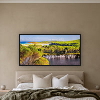 Bournda Lagoon from the Hilltop wide panorama in a black frame above a linen bed — wall art, Sapphire Coast NSW