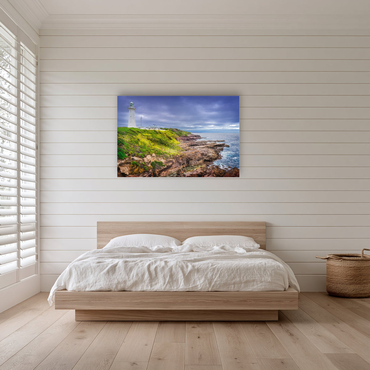Green Cape Lighthouse acrylic panel wall art in a shiplap-panelled bedroom