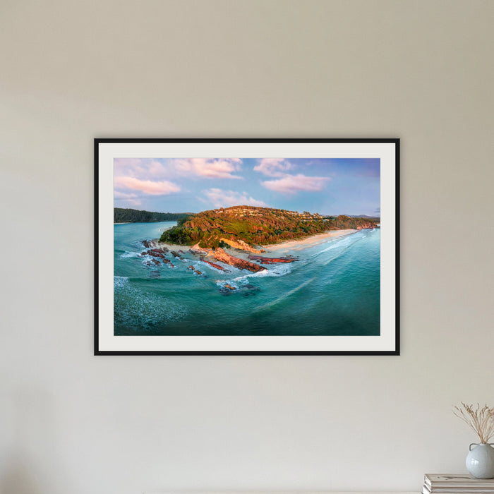 Pambula Beach Seascape framed print in black with a white mat, in a hallway