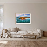 Pambula Beach Seascape framed print in oak with a white mat, in a lounge room