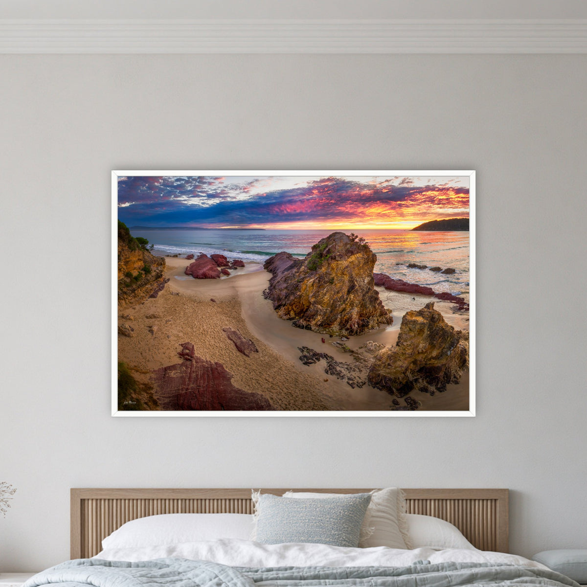 Pambula Beach Sunrise in a white frame without a mat, on a coastal bedroom wall