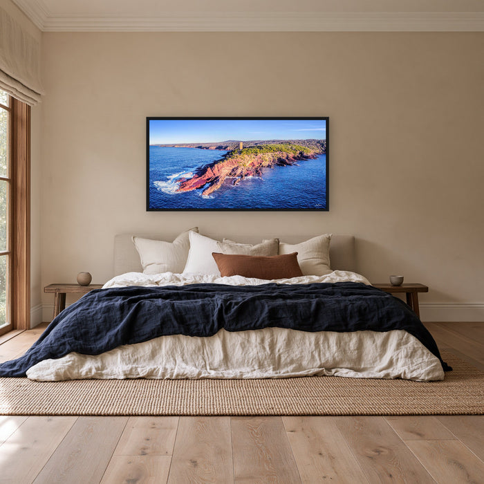 Ben Boyd Tower at Golden Hour wide panorama in a black frame above a linen bed — wall art, Eden NSW