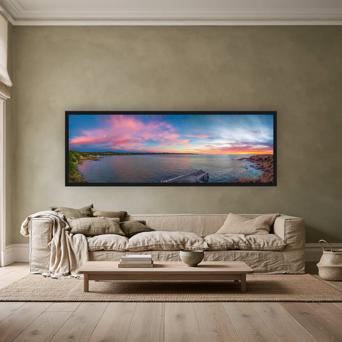 Tathra Sunrise super wide panorama in a black frame above a linen sofa — wall art, Sapphire Coast NSW