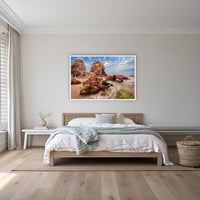 Pambula Rocks in a white frame without a mat, on a coastal bedroom wall
