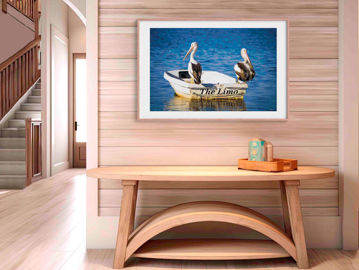 Pelicans Limo wall art — pelicans riding bow of boat on Merimbula Lake, NSW