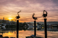 Pelican sculptures Fishpen Merimbula print, golden sunrise over Merimbula Lake