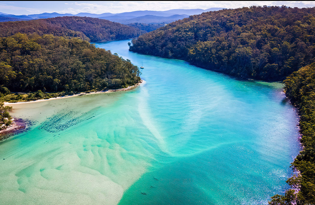 Pambula River aerial print, vivid turquoise water from above