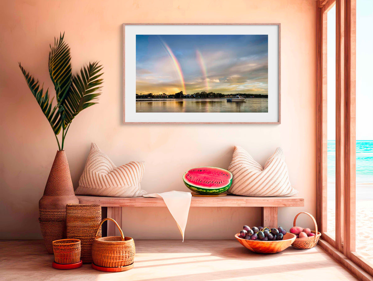Rainbow on Merimbula Lake wall art — full arc rainbow reflected in winter lake, NSW