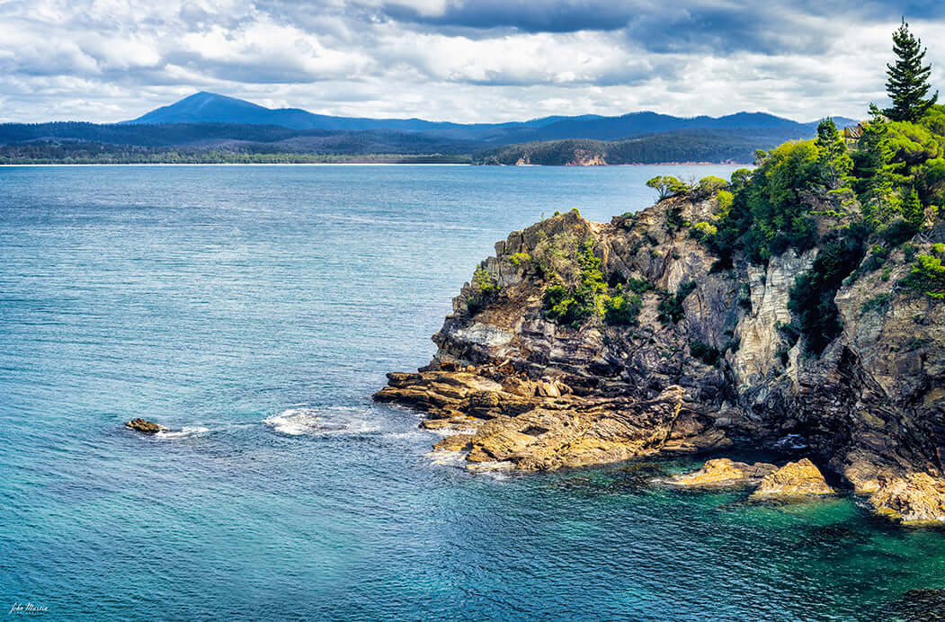 Twofold Bay Eden rocky cliffs print with Balawan Mount Imlay in distance
