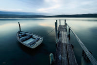Weathered dinghy at Fishpen jetty, Merimbula Lake NSW — artistic treatment — fine art print