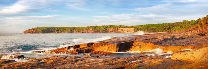 Short Point Merimbula dawn panorama, rocky foreshore and golden light