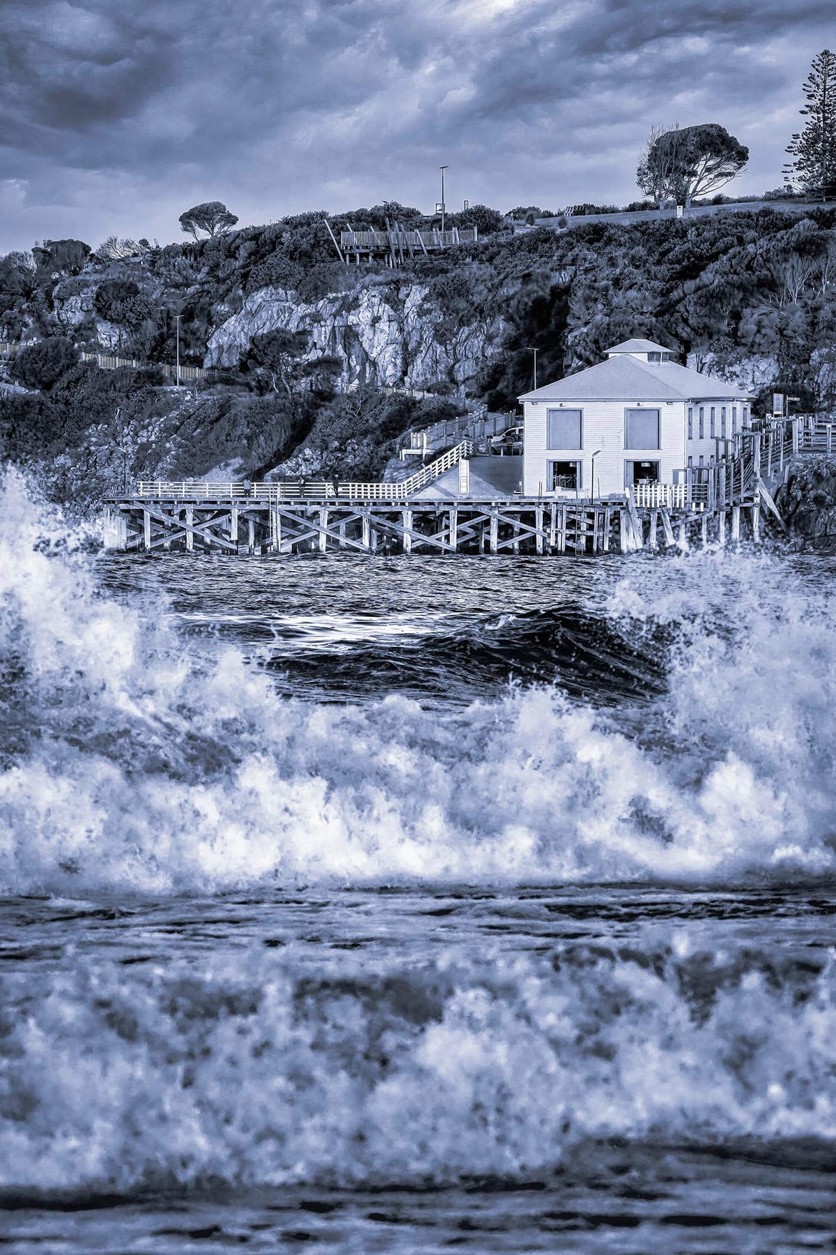 Tathra Wharf black and white print, dramatic waves against historic wharf